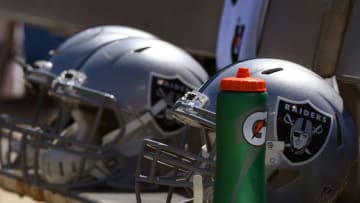 OAKLAND, CA - SEPTEMBER 18: A detailed view of Oakland Raiders helmets sitting on the bench during the National Anthem prior to their game against the Atlanta Falcons at Oakland-Alameda County Coliseum on September 18, 2016 in Oakland, California. (Photo by Thearon W. Henderson/Getty Images)