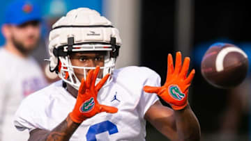 Florida Gators wide receiver Andy Jean (6) keeps his eye on the ball while running pass routes Thursday. The University of Florida Gators held a Spring football practice at Sanders Practice Fields in Gainesville, FL on Thursday, March 9, 2023. [Doug Engle/Gainesville Sun]Gai Uffootballspring3