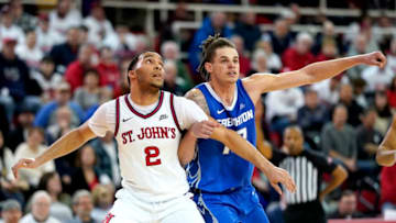 NEW YORK, NEW YORK - MARCH 01: Julian Champagnie #2 of the St. John's Red Storm and Christian Bishop #13 of the Creighton Bluejays battle for position at Carnesecca Arena on March 01, 2020 in New York City. (Photo by Steven Ryan/Getty Images)
