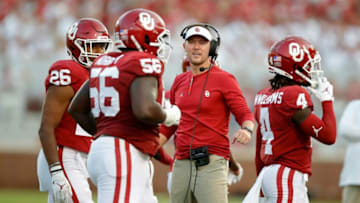 Oklahoma coach Lincoln Riley greets players after a touchdown during a college football game between the University of Oklahoma Sooners (OU) and the Western Carolina Catamounts at Gaylord Family-Oklahoma Memorial Stadium in Norman, Okla., Saturday, Sept. 11, 2021.Lx16429