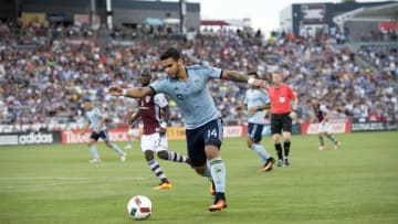 Jul 16, 2016; Commerce City, CO, USA; Sporting Kansas City forward Dom Dwyer (14) controls the ball in the first half of the match against the Colorado Rapids at Dicks Sporting Goods Park. Mandatory Credit: Ron Chenoy-USA TODAY Sports