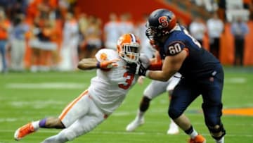 Oct 5, 2013; Syracuse, NY, USA; Clemson Tigers defensive end Vic Beasley (3) is blocked by Syracuse Orange offensive tackle Sean Hickey (60) during the third quarter at the Carrier Dome. Clemson defeated Syracuse 49-14. Mandatory Credit: Rich Barnes-USA TODAY Sports