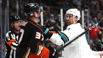 ANAHEIM, CALIFORNIA - NOVEMBER 14: Brenden Dillon #4 of the San Jose Sharks grabs Nick Ritchie #37 of the Anaheim Ducks during the third period of a game at Honda Center on November 14, 2019 in Anaheim, California. (Photo by Sean M. Haffey/Getty Images)