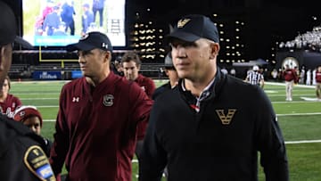 South Carolina head coach Shane Beamer approaching Vanderbilt head coach Clark Lea for a handshake after the Gamecocks beat the Commodores in 2022. Mandatory Credit: Christopher Hanewinckel-USA TODAY Sports
