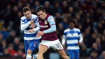 BIRMINGHAM, ENGLAND - MARCH 13: Jack Grealish of Aston Villa and of Josh Scowen of Queens Park Rangers in action during the Sky Bet Championship match between Aston Villa and Queens Park Rangers at Villa Park on March 13, 2018 in Birmingham, England. (Photo by Nathan Stirk/Getty Images,)