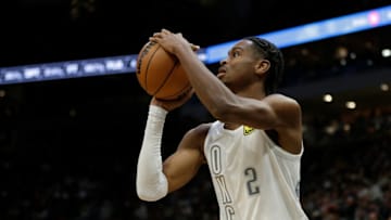 Shai Gilgeous-Alexander #2 of the Oklahoma City Thunder shoots a jump shot during the second half of the game against the Milwaukee Bucks at Fiserv Forum on November 19, 2021 in Milwaukee, Wisconsin. Bucks defeated the Thunder 96-89. NOTE TO USER: User expressly acknowledges and agrees that, by downloading and or using this photograph, User is consenting to the terms and conditions of the Getty Images License Agreement. (Photo by John Fisher/Getty Images)