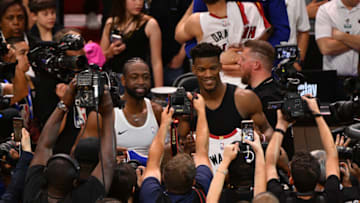 Dwyane Wade #3 of the Miami Heat and Jimmy Butler #23 of the Philadelphia 76ers (Photo by Mark Brown/Getty Images)