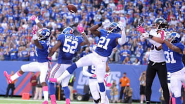 Oct 16, 2016; East Rutherford, NJ, USA; New York Giants corner back Dominique Rodgers-Cromartie (41) and linebacker Jonathan Casillas (52) and safety Landon Collins (21) break up a pass intended for Baltimore Ravens tight end Dennis Pitta (88) on the final play of the fourth quarter at MetLife Stadium. Mandatory Credit: Brad Penner-USA TODAY Sports
