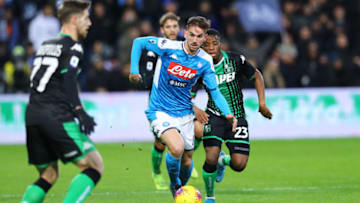 MAPEI STADIUM, REGGIO EMILIA, EMILIA ROMAGNA, ITALY - 2019/12/22: Napoli's Spanish midfielder Fabian Ruiz (L) fights for the ball with Sassuolo's Ivorian midfielder Hamed Junior Traore during the Italian Serie A football match US Sassuolo vs SSC Napoli.Napoli won 2-1. (Photo by Pietro Mosca/KONTROLAB/LightRocket via Getty Images)