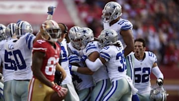 Oct 2, 2016; Santa Clara, CA, USA; The Dallas Cowboys celebrate stopping a first down conversion by San Francisco 49ers wide receiver Torrey Smith (left) during the fourth quarter at Levi