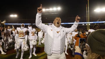 AMES, IA - NOVEMBER 18: Steve Sarkisian head coach of the Texas Longhorns celebrates with his team and Texas Longhorns fans after winning 26-16 over the Iowa State Cyclones at Jack Trice Stadium on November 18, 2023 in Ames, Iowa. The Texas Longhorns won 26-16 over the Iowa State Cyclones. (Photo by David Purdy/Getty Images)