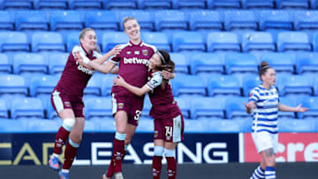 READING, ENGLAND - FEBRUARY 27: Dagny Brynjarsdottir of West Ham United is congratulated after scoring the opening goal in extra time during the Vitality Women's FA Cup Fifth Round match between Reading FC Women and West Ham United Women at the Select Car Leasing Stadium on February 27, 2022 in Reading, England. (Photo by Warren Little/Getty Images)