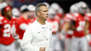 INDIANAPOLIS, INDIANA - DECEMBER 01: Head coach Urban Meyer of the Ohio State Buckeyes runs off the field at halftime in the game against the Northwestern Wildcats at Lucas Oil Stadium on December 01, 2018 in Indianapolis, Indiana. (Photo by Joe Robbins/Getty Images)