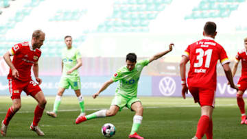 WOLFSBURG, GERMANY - MAY 08: Josip Brekalo of VfL Wolfsburg scores their team's third goal during the Bundesliga match between VfL Wolfsburg and 1. FC Union Berlin at Volkswagen Arena on May 08, 2021 in Wolfsburg, Germany. Sporting stadiums around Germany remain under strict restrictions due to the Coronavirus Pandemic as Government social distancing laws prohibit fans inside venues resulting in games being played behind closed doors. (Photo by Maja Hitij/Getty Images)
