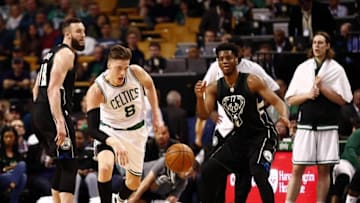 Apr 8, 2016; Boston, MA, USA; Boston Celtics forward Jonas Jerebko (8) steals the ball from Milwaukee Bucks forward Damien Inglis (17) during the second half at TD Garden. Mandatory Credit: Mark L. Baer-USA TODAY Sports