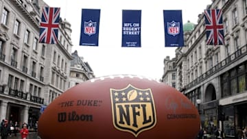 Oct 1, 2016; London, United Kingdom; Genera view of the NFL Duke Wilson inflatable football and United States and British flags and NFL shield logo banners at NFL on Regent Street prior to the International Series game between the Indianapolis Colts and the Jacksonville Jaguars. Mandatory Credit: Kirby Lee-USA TODAY Sports