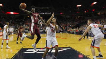 Dec 31, 2016; Charlottesville, VA, USA; Florida State Seminoles forward Jonathan Isaac (1) shoots the ball as Virginia Cavaliers forward Isaiah Wilkins (21) defends in the second half at John Paul Jones Arena. The Seminoles won 60-58. Mandatory Credit: Geoff Burke-USA TODAY Sports