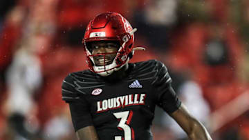 Louisville's Malik Cunningham smiles after he ran for 14-yard run in the fourth quarter against Boston College to seal the win at Cardinal Stadium. UofL is now 4-3 and breaks a two-game losing streak. Oct. 23, 2021 Syndication: The Courier-Journal
