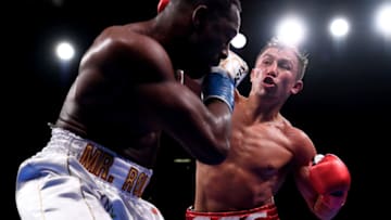 NEW YORK, NEW YORK - JUNE 08: Gannadiy Golovkin of Kazakhstan (red trunks) trades punches with Steve Rolls of Canada (white trunks) during their Super Middleweights fight at Madison Square Garden on June 08, 2019 in New York City. (Photo by Sarah Stier/Getty Images)