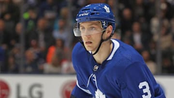 TORONTON, ON - JANUARY 6: Travis Dermott #3 of the Toronto Maple Leafs skates in his 1st NHL game against the Vancouver Canucks at the Air Canada Centre on January 6, 2018 in Toronto, Ontario, Canada. The Maple Leafs defeated the Canucks 3-2 in an overtime shoot-out. (Photo by Claus Andersen/Getty Images)