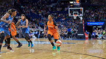 Alex Bentley of the Connecticut Sun dribbles the ball in a game against the Minnesota Lynx at Target Center. Photo by Abe Booker, III
