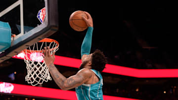 Jan 21, 2022; Charlotte, North Carolina, USA; Charlotte Hornets forward Miles Bridges (0) dunks during the second half against the Oklahoma City Thunder at The Spectrum Center. Mandatory Credit: Sam Sharpe-USA TODAY Sports