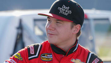 TALLADEGA, AL - OCTOBER 12: Austin Wayne Self, driver of the #22 GO TEXAN Chevrolet, stands by his truck during qualifying for the NASCAR Camping World Truck Series Fr8Auctions 250 at Talladega Superspeedway on October 12, 2018 in Talladega, Alabama. (Photo by Brian Lawdermilk/Getty Images)