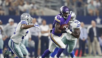 Aug 29, 2015; Arlington, TX, USA; Minnesota Vikings receiver Stefon Diggs (14) runs after a reception against Dallas Cowboys linebacker Jasper Brinkley (54) and cornerback Byron Jones (31) at AT&T Stadium. Mandatory Credit: Matthew Emmons-USA TODAY Sports