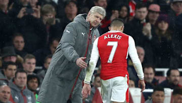 LONDON, ENGLAND - DECEMBER 10: Arsene Wenger, Manager of Arsenal (L) embraces Alexis Sanchez of Arsenal (R) after he is subbed during the Premier League match between Arsenal and Stoke City at the Emirates Stadium on December 10, 2016 in London, England. (Photo by Clive Rose/Getty Images)