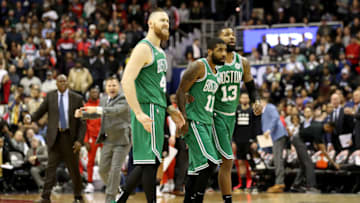 WASHINGTON, DC - DECEMBER 12: Aron Baynes #46, Kyrie Irving #11, and Marcus Morris #13 of the Boston Celtics walk off the floor during a second half timeout against the Washington Wizards at Capital One Arena on December 12, 2018 in Washington, DC. NOTE TO USER: User expressly acknowledges and agrees that, by downloading and or using this photograph, User is consenting to the terms and conditions of the Getty Images License Agreement. (Photo by Rob Carr/Getty Images)