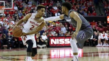 Jan 19, 2016; College Park, MD, USA; Maryland Terrapins guard Melo Trimble (2) defended by Northwestern Wildcats guard Sanjay Lumpkin (34) at Xfinity Center. Mandatory Credit: Mitch Stringer-USA TODAY Sports