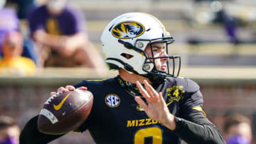 Oct 10, 2020; Columbia, Missouri, USA; Missouri Tigers quarterback Connor Bazelak (8) throws a pass against the LSU Tigers defends during the second half at Faurot Field at Memorial Stadium. Mandatory Credit: Jay Biggerstaff-USA TODAY Sports