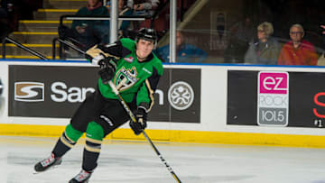 KELOWNA, BC - JANUARY 19: Aliaksei Protas #21 of the Prince Albert Raiders passes the puck against the Kelowna Rockets at Prospera Place on January 19, 2019 in Kelowna, Canada. (Photo by Marissa Baecker/Getty Images)
