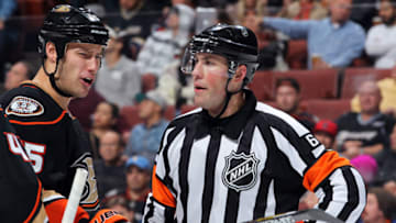 ANAHEIM, CA - DECEMBER 10: Ryan Getzlaf #15 of the Anaheim Ducks talks with referee Francis Charron #6 during the game against the Edmonton Oilers on December 10, 2014 at Honda Center in Anaheim, California. (Photo by Debora Robinson/NHLI via Getty Images)