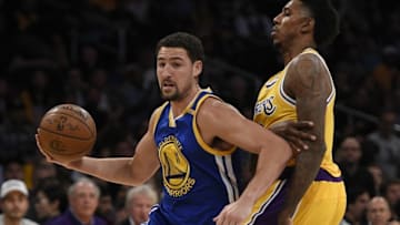 Nov 4, 2016; Los Angeles, CA, USA; Golden State Warriors guard Klay Thompson (11) drives the ball defended by Los Angeles Lakers guard Nick Young (0) during the first quarter at Staples Center. Mandatory Credit: Kelvin Kuo-USA TODAY Sports