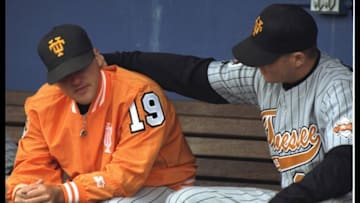 7 Jun 1995: Tennessee players console each other after losing to Cal State Fullerton in a College World Series game at Rosenblatt Stadium. Cal State won the game, 11-0.