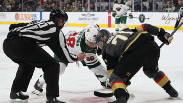 LAS VEGAS, NEVADA - DECEMBER 17: William Karlsson #71 of the Vegas Golden Knights faces off with Ryan Hartman #38 of the Minnesota Wild during the second period at T-Mobile Arena on December 17, 2019 in Las Vegas, Nevada. (Photo by Zak Krill/NHLI via Getty Images)
