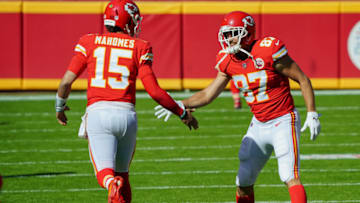 Nov 1, 2020; Kansas City, Missouri, USA; Kansas City Chiefs tight end Travis Kelce (87) greets quarterback Patrick Mahomes (15) before the game against the New York Jets at Arrowhead Stadium. Mandatory Credit: Jay Biggerstaff-USA TODAY Sports