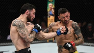 OTTAWA, ON - MAY 04: (L-R) Shane Burgos punches Cub Swanson in their featherweight bout during the UFC Fight Night event at Canadian Tire Centre on May 4, 2019 in Ottawa, Ontario, Canada. (Photo by Jeff Bottari/Zuffa LLC/Zuffa LLC via Getty Images)