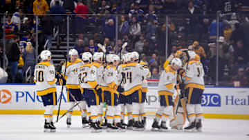 Nov 11, 2021; St. Louis, Missouri, USA; Nashville Predators celebrate after defeating the St. Louis Blues in overtime at Enterprise Center. Mandatory Credit: Jeff Curry-USA TODAY Sports