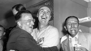 UNITED STATES - OCTOBER 05: Brooklyn Dodgers president Walter O'Malley and his manager, Walter Alston, exchange hugs and grins after bringing Brooklyn its first World Series championship in history. Flock did it the hard way, winning the final game in Yankee Stadium. (Photo by NY Daily News Archive via Getty Images)