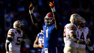 GAINESVILLE, FLORIDA - NOVEMBER 27: Brenton Cox Jr. #1 of the Florida Gators reacts during the fourth quarter of a game against the Florida State Seminoles at Ben Hill Griffin Stadium on November 27, 2021 in Gainesville, Florida. (Photo by James Gilbert/Getty Images)