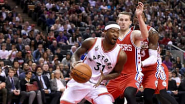 Apr 12, 2016; Toronto, Ontario, CAN; Toronto Raptors guard Terrence Ross (31) cuts to the basket past Philadelphia 76ers guard Nik Stauskas (11) in the second half of the Raptors 122-98 win at Air Canada Centre. Mandatory Credit: Dan Hamilton-USA TODAY Sports