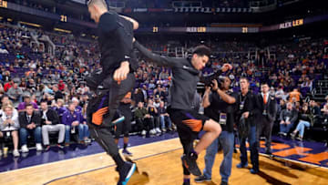 PHOENIX, AZ - FEBRUARY 24: Alex Len #21 and Devin Booker #1 of the Phoenix Suns before the game against the Portland Trail Blazers on February 24, 2018 at Talking Stick Resort Arena in Phoenix, Arizona. NOTE TO USER: User expressly acknowledges and agrees that, by downloading and/or using this photograph, user is consenting to the terms and conditions of the Getty Images License Agreement. Mandatory Copyright Notice: Copyright 2018 NBAE (Photo by Barry Gossage/NBAE via Getty Images)
