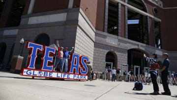 Apr 4, 2016; Arlington, TX, USA; Fans pose outside the stadium before the game between the Texas Rangers and the Seattle Mariners at Globe Life Park in Arlington. Mandatory Credit: Tim Heitman-USA TODAY Sports