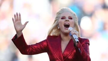 Feb 7, 2016; Santa Clara, CA, USA; Recording artist Lady Gaga performs the national anthem before Super Bowl 50 between the Carolina Panthers and the Denver Broncos at Levi