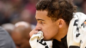 CLEVELAND, OHIO - DECEMBER 23: Trae Young #11 of the Atlanta Hawks watches from the bench during the second half against the Cleveland Cavaliers at Rocket Mortgage Fieldhouse on December 23, 2019 in Cleveland, Ohio. The Cavaliers defeated the Hawks 121-118. NOTE TO USER: User expressly acknowledges and agrees that, by downloading and/or using this photograph, user is consenting to the terms and conditions of the Getty Images License Agreement. (Photo by Jason Miller/Getty Images)