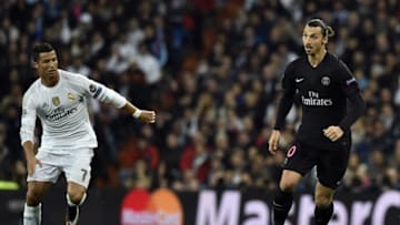 Paris Saint-Germain's Swedish forward Zlatan Ibrahimovic (R) controls a ball next to Real Madrid's Portuguese forward Cristiano Ronaldo during the UEFA Champions League group stage football match Real Madrid CF vs Paris Saint-Germain (PSG) at the Santiago Bernabeu stadium in Madrid on November 3, 2015. AFP PHOTO / GERARD JULIEN (Photo credit should read GERARD JULIEN/AFP/Getty Images)