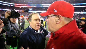 FOXBORO, MA - JANUARY 16: Head coach Bill Belichick of the New England Patriots and head coach Andy Reid of the Kansas City Chiefs shake hands after the AFC Divisional Playoff Game at Gillette Stadium on January 16, 2016 in Foxboro, Massachusetts. The Patriots defeated the Chiefs 27-20. (Photo by Jim Rogash/Getty Images)