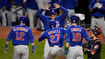 CLEVELAND, OH - NOVEMBER 01: Addison Russell #27 of the Chicago Cubs celebrates with Anthony Rizzo #44, Ben Zobrist #18 and Kyle Schwarber #12 after hitting a grand slam home run during the third inning against the Cleveland Indians in Game Six of the 2016 World Series at Progressive Field on November 1, 2016 in Cleveland, Ohio. (Photo by Jason Miller/Getty Images)